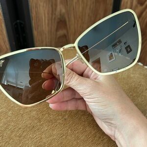 Maui Jims, hold cat eye frames